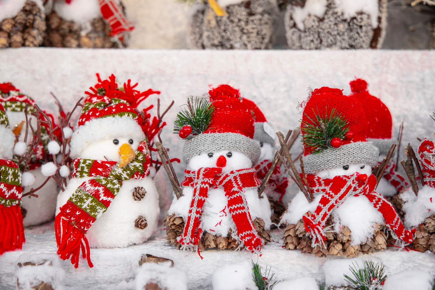 Decorative snowmen sitting in a row, how to have a healthy holiday season with IBS